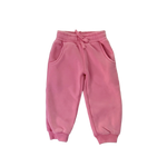 Pink sweatpants on a light gray background
